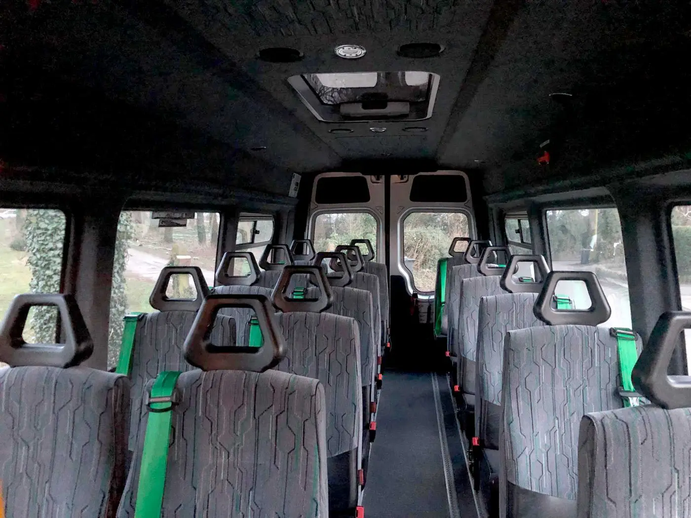 Interior of wheelchair-accessible van with secure wheelchair space and comfortable seating