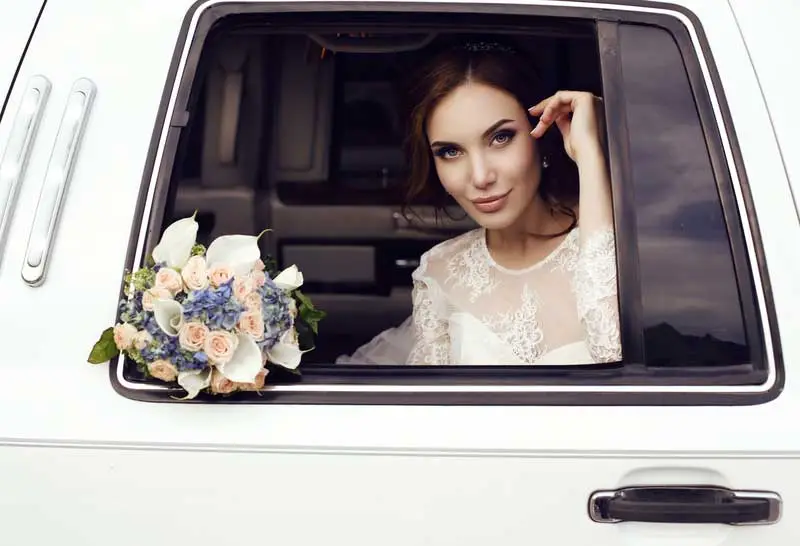 bride at window of car